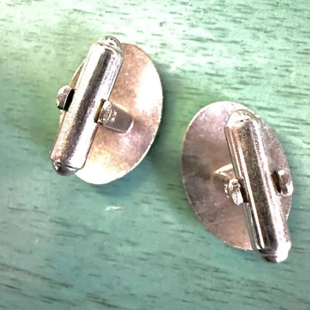 Silver tone oval vintage cuff links